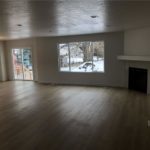 Living room with hardwood floors in new rental home listing in Heber City, UT
